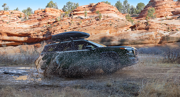 All wheel drive outback taking on muddy trails